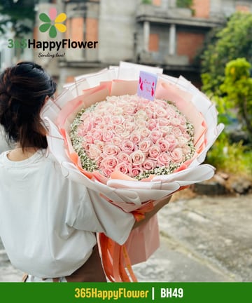 Bó hoa hồng phấn khổ đại viền baby giấy trắng cam đào BH49