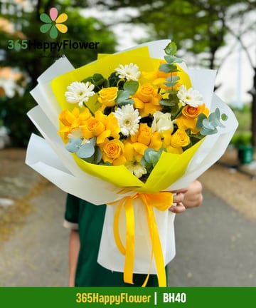 Bó hoa hồng vàng cam phối đồng tiền trắng giấy trắng BH40