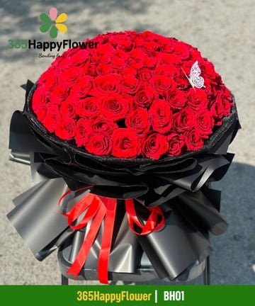Bó hoa hồng đỏ khổ đại giấy đen viền kim tuyến BH01