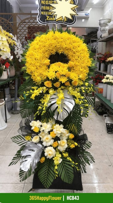 Kệ hoa tang 2 tầng cúc vàng hồng vàng lá monstera bạc HCB43