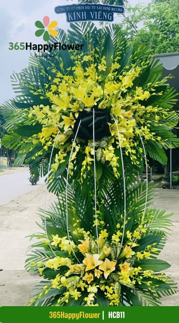 Kệ hoa chia buồn dáng oval lan vàng ly cam khung trắng HCB11