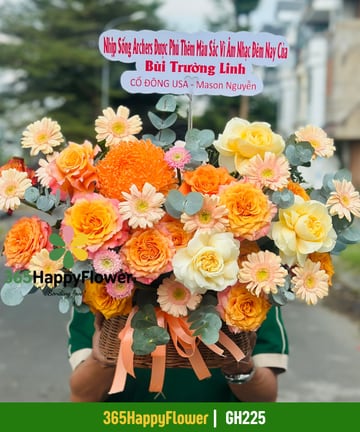 Giỏ hoa hồng cam đào và đồng tiền cam đào giỏ mây GH225